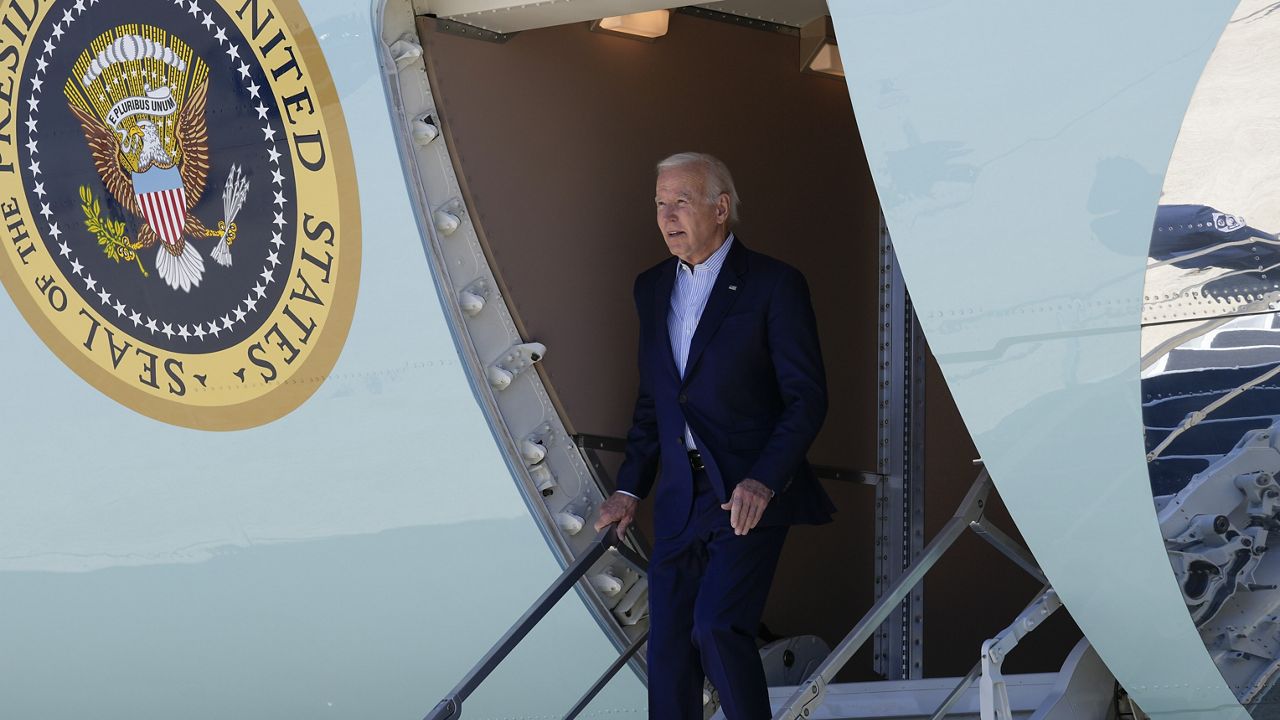 President Joe Biden walks down the steps of Air Force One at Moffett Federal Airfield, Calif., Monday, June 19, 2023. (AP Photo/Susan Walsh)