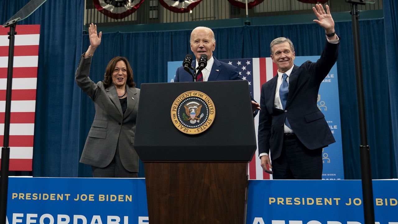From left, Vice President Kamala Harris, President Joe Biden and Democratic North Carolina Governor Roy Cooper wave to and address the audience during campaign event in Raleigh, N.C., Tuesday, March 26, 2024. (AP Photo/Stephanie Scarbrough)
