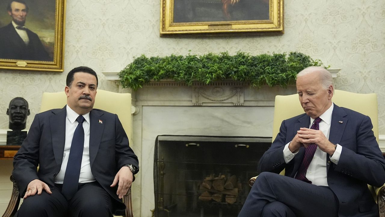 President Joe Biden, right, and Iraqi Prime Minister Mohammed S. Al-Sudani meet in the Oval Office of the White House, Monday, April 15, 2024, in Washington. (AP Photo/Alex Brandon)