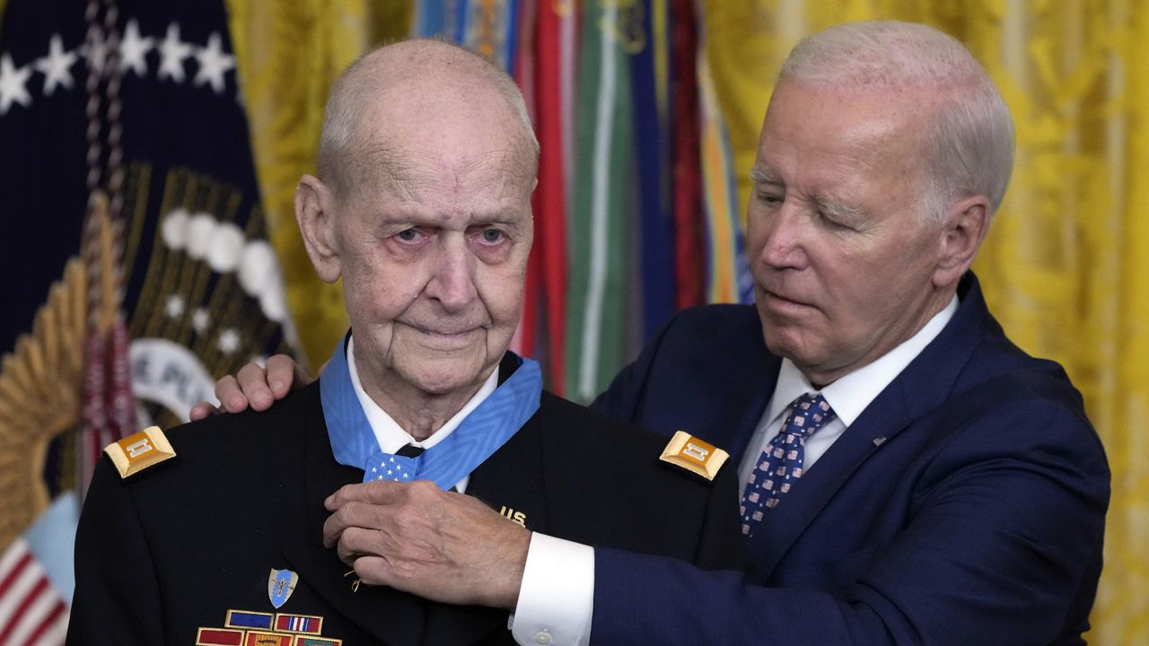 President Joe Biden awards the Medal of Honor to Capt. Larry Taylor, an Army pilot from the Vietnam War who risked his life to rescue a reconnaissance team that was about to be overrun by the enemy, during a ceremony Tuesday, Sept. 5, 2023, in the East Room of the White House in Washington. (AP Photo/Jacquelyn Martin)