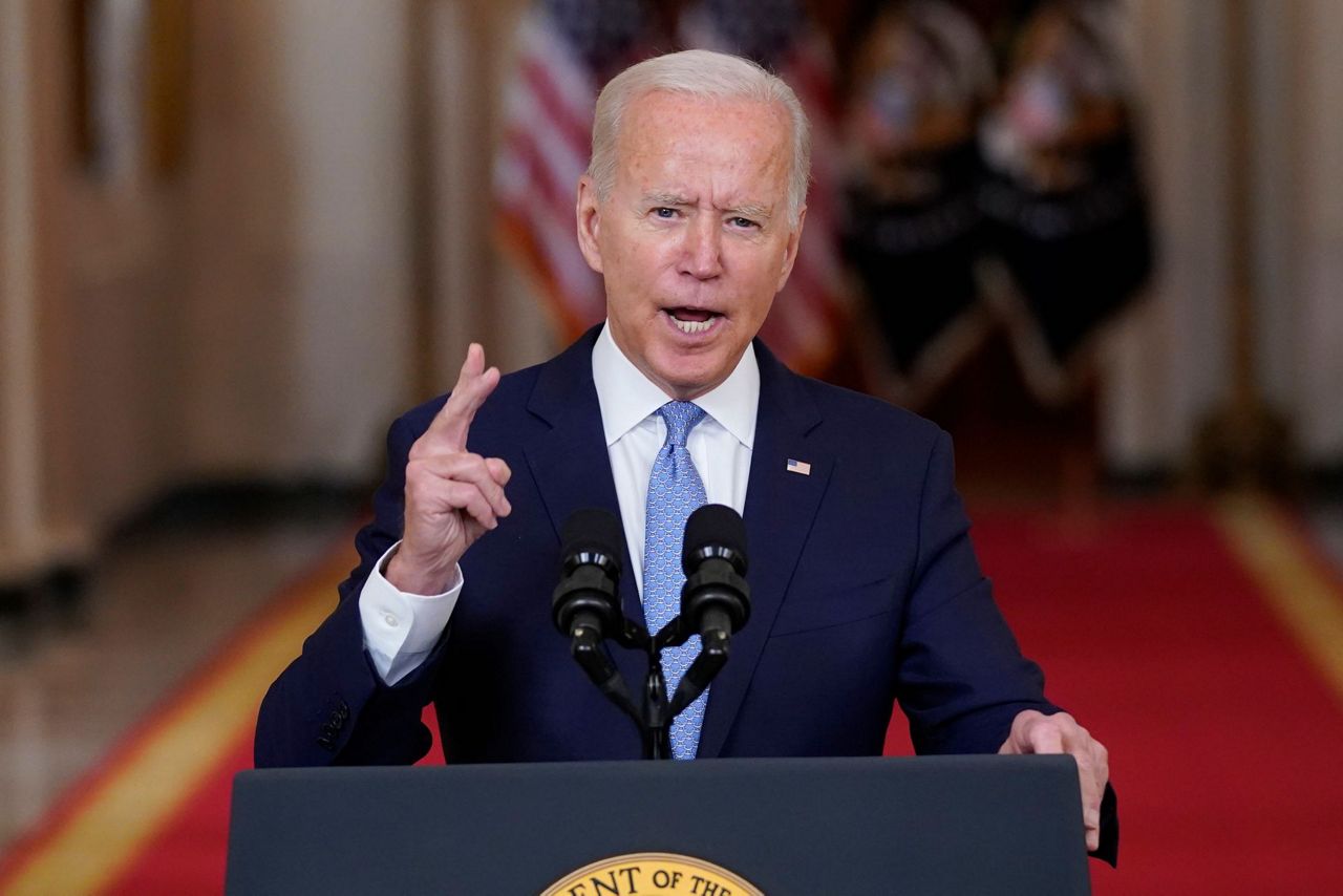 By The Numbers: Stats That Tell Story Of Biden's First Year