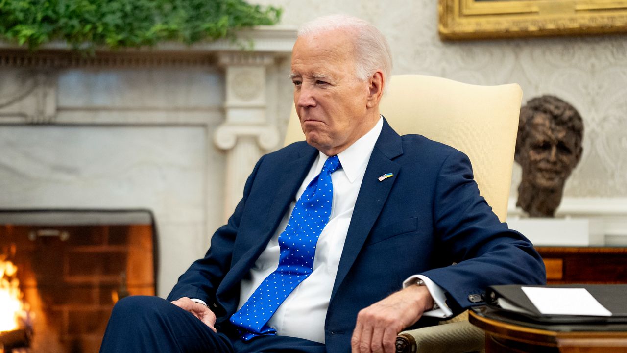 President Joe Biden sits in the Oval Office of the White House, Friday, Feb. 9, 2024, in Washington. (AP Photo/Andrew Harnik, File)