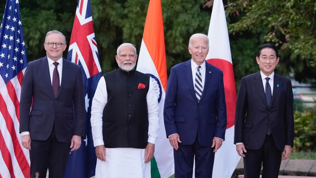 President Joe Biden, joined by Australia's Prime Minister Anthony Albanese, Japan's Prime Minister Fumio Kishida, and India's Prime Minister Narendra Modi, stand for a group photo before speaking about a Quadrilateral Cancer Moonshot initiative on the sidelines of the Quad leaders summit at Archmere Academy in Claymont, Del., Saturday, Sept. 21, 2024. (AP Photo/Mark Schiefelbein)