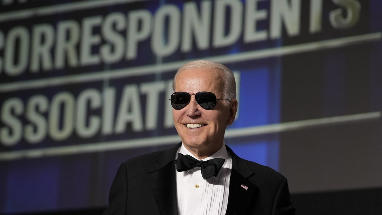 President Joe Biden wears sunglasses after making a joke about becoming the "Dark Brandon" persona during the White House Correspondents' Association dinner at the Washington Hilton in Washington, Saturday, April 29, 2023. (AP Photo/Carolyn Kaster)