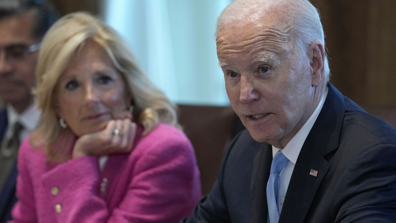 President Joe Biden, right, speaks during a meeting of his Cancer Cabinet in the Cabinet Room at the White House in Washington, Wednesday, Sept. 13, 2023. Health and Human Services Secretary Xavier Becerra, left, and first lady Jill Biden, center, listen. (AP Photo/Susan Walsh)