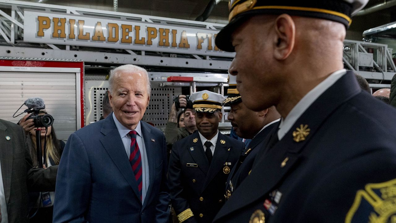 President Joe Biden greets firefighters in the audience after speaking at Engine 13 in Philadelphia, Monday, Dec. 11, 2023, for an event recognizing that the city of Philadelphia is receiving a $22.4 million SAFER Grant, that enables the Philadelphia Fire Department to reopen three fire companies. (AP Photo/Andrew Harnik)