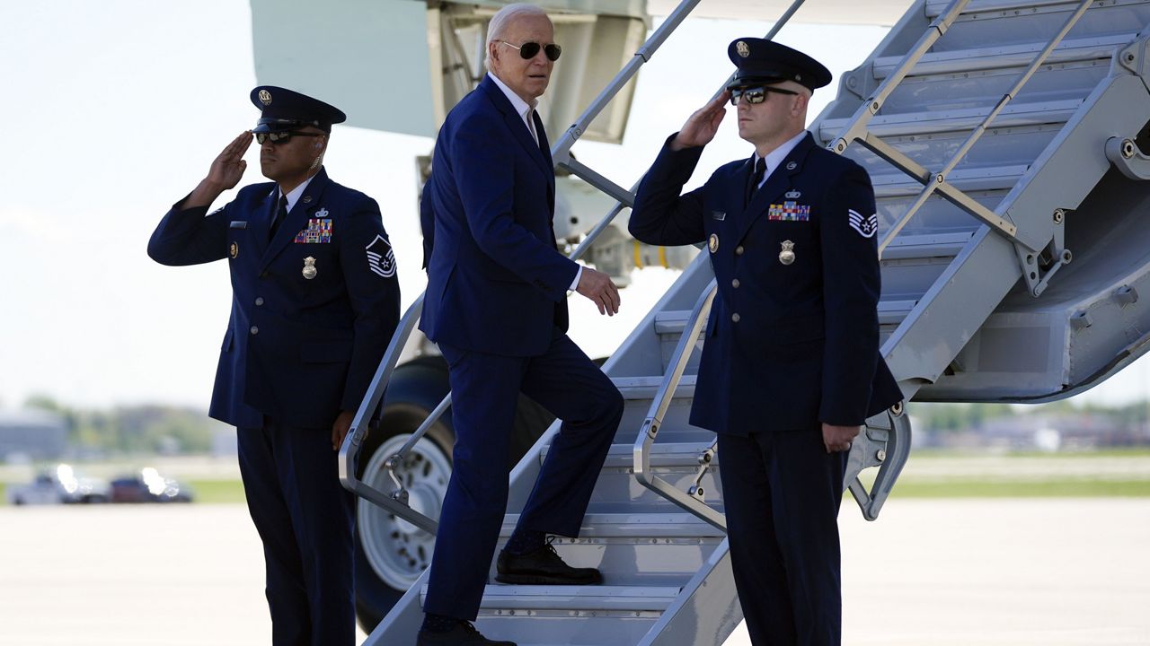 President Joe Biden boards Air Force One as he departs Milwaukee Mitchell International Airport, Wednesday, May 8, 2024, in Milwaukee. (AP Photo/Evan Vucci)