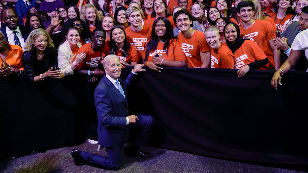 President Joe Biden poses for a photo with the Students Demand Action group after speaking at the National Safer Communities Summit at the University of Hartford in West Hartford, Conn., June 16, 2023. The oldest president in American history, Joe Biden would be 86 by the end of his second term, should he win one. (AP Photo/Susan Walsh, File)