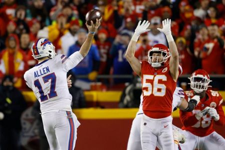 Kansas City Chiefs quarterback Patrick Mahomes (15) celebrates after  throwing a touchdown pass during the first half of an NFL divisional round  playoff football game against the Buffalo Bills, Sunday, Jan. 23