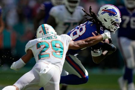 Dolphins halt Allen, survive 'butt punt' to beat Bills