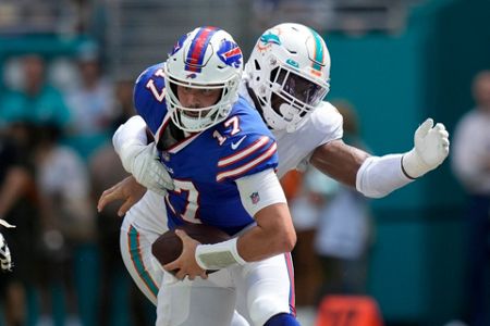 Miami Dolphins halt Josh Allen, survive 'butt punt' to beat Bills