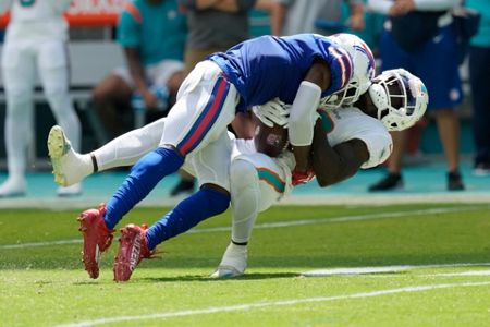 Dolphins halt Allen, survive 'butt punt' to beat Bills