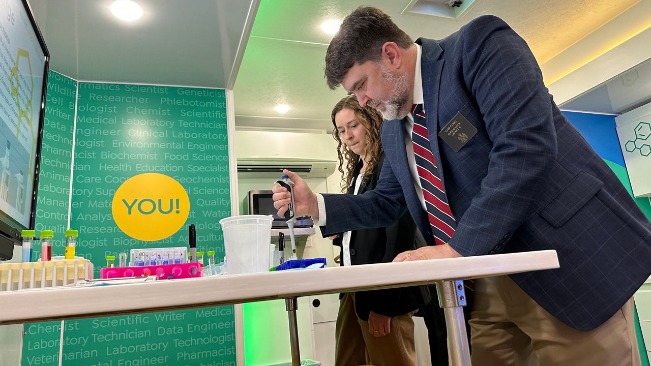 Sen. Chip Curry (D-Belfast) checks out the mobile learning lab that will soon head to schools, beginning in Fort Kent next week. (Spectrum News/Susan Cover)