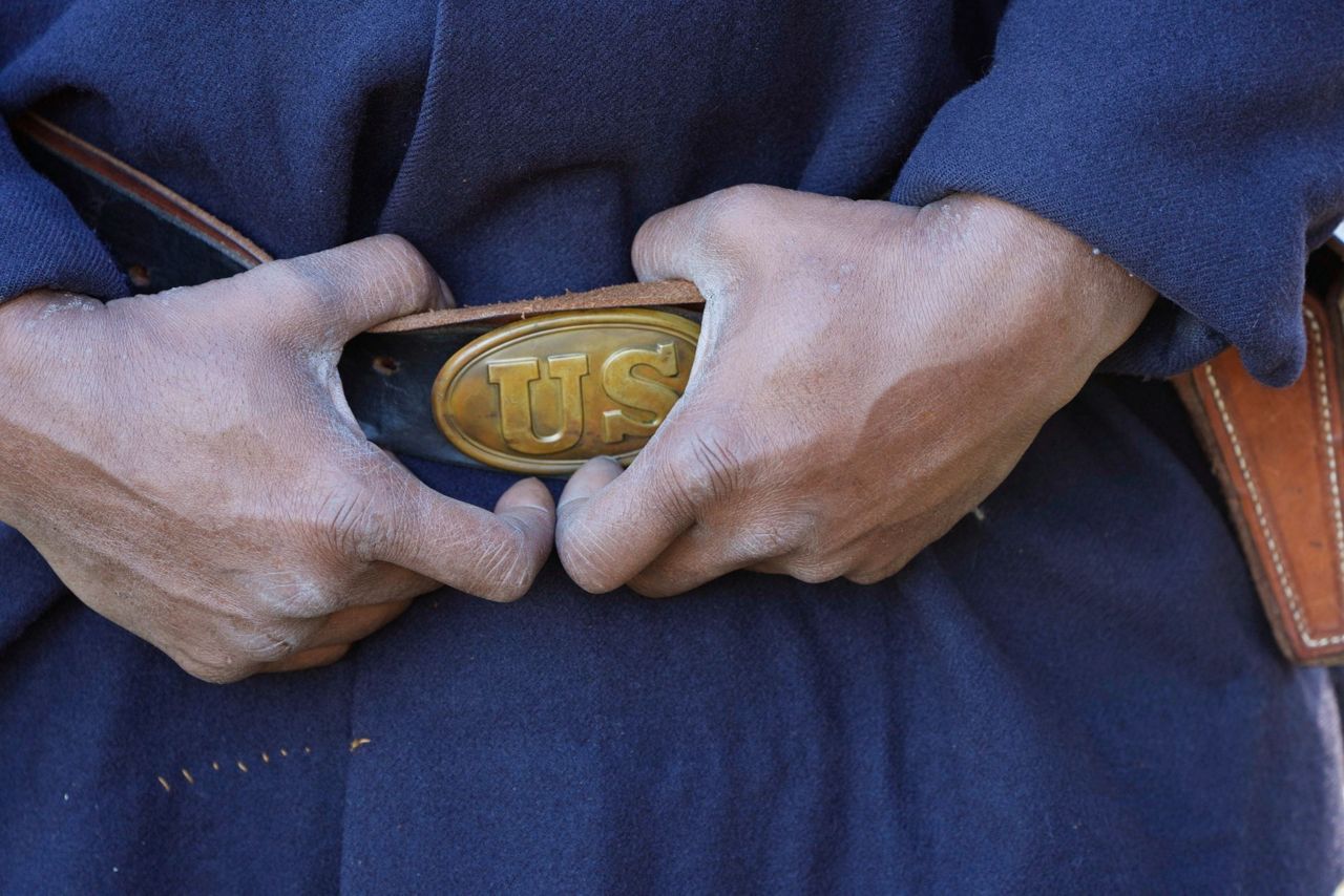 Black soldiers are honored, name by name, at a Civil War battlefield