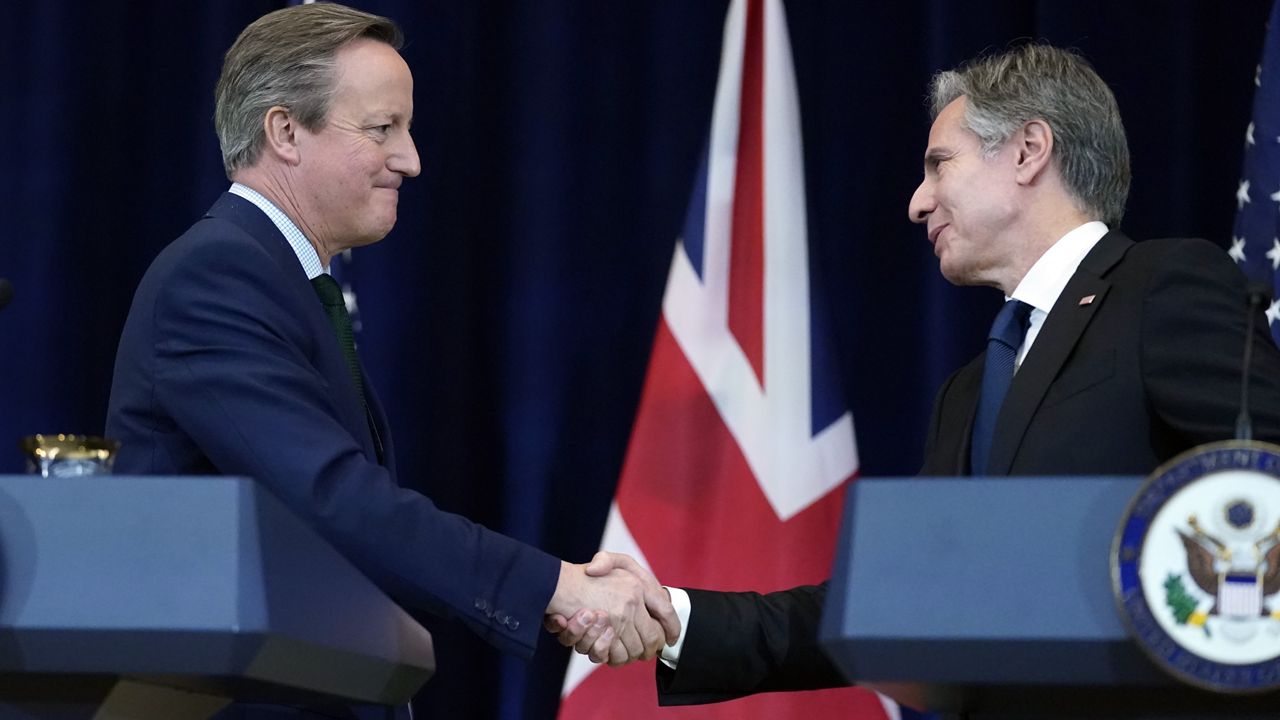 Secretary of State Antony Blinken and British Foreign Secretary David Cameron shake hands after speaking during a media availability at the State Department, Thursday, Dec. 7, 2023 in Washington. (AP Photo/Alex Brandon)