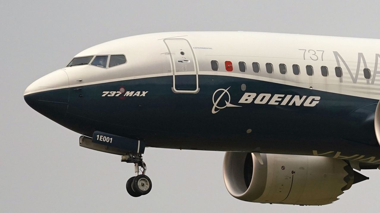 A Boeing 737 Max jet, piloted by Federal Aviation Administration (FAA) chief Steve Dickson, prepares to land at Boeing Field following a test flight on Sept. 30, 2020 in Seattle. (AP Photo/Elaine Thompson, File)