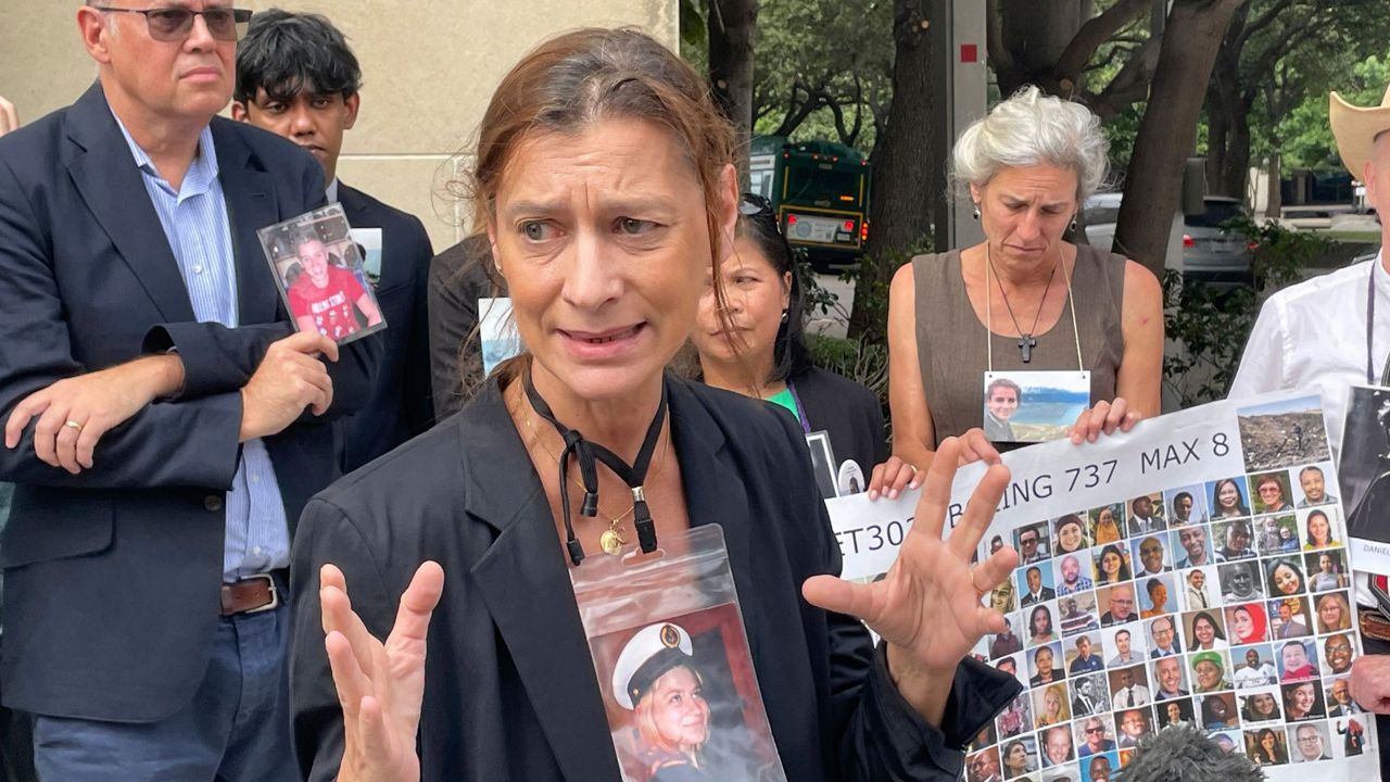 Catherine Berthet, whose daughter Camille Geoffrey died in the March, 2019, crash of an Ethiopian Airlines 737 Max, speaks outside federal court in Fort Worth, Texas, on Friday, Oct. 11, 2024. Lawyers are asking a federal judge to throw out a plea agreement that the aircraft manufacturer Boeing struck with federal prosecutors. (AP Photo/Dave Koenig)