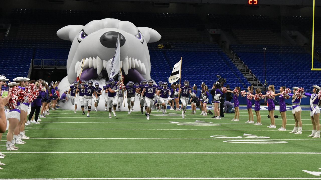 Boerne football team coming out to the field. (Boerne ISD Twitter)