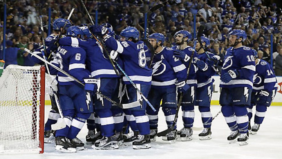 The Tampa Bay Lightning celebrate their win over the Boston Bruins in Game 5 of an NHL second-round hockey playoff series Sunday, May 6, 2018, in Tampa, Fla. (AP Photo/Chris O’Meara)