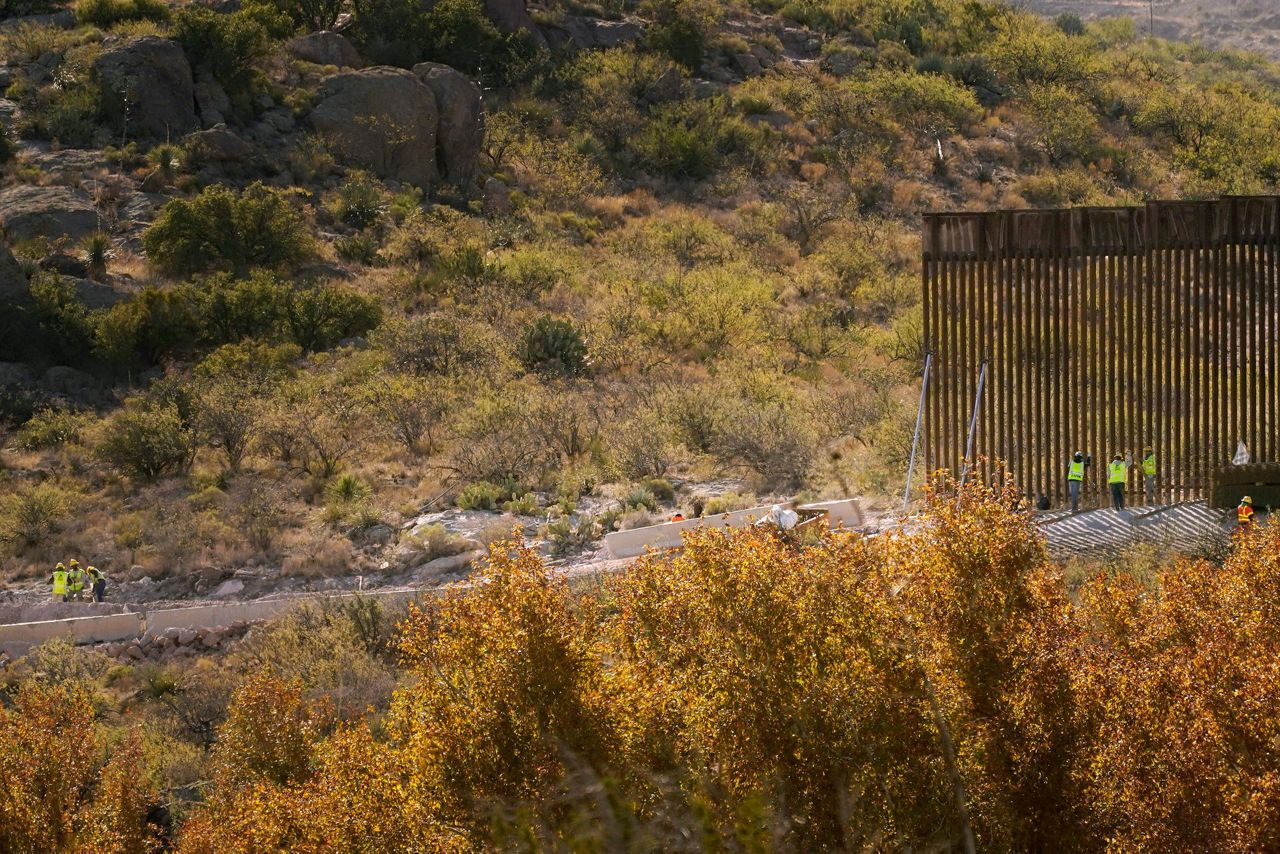 Damage from border wall blownup mountains, toppled cactus