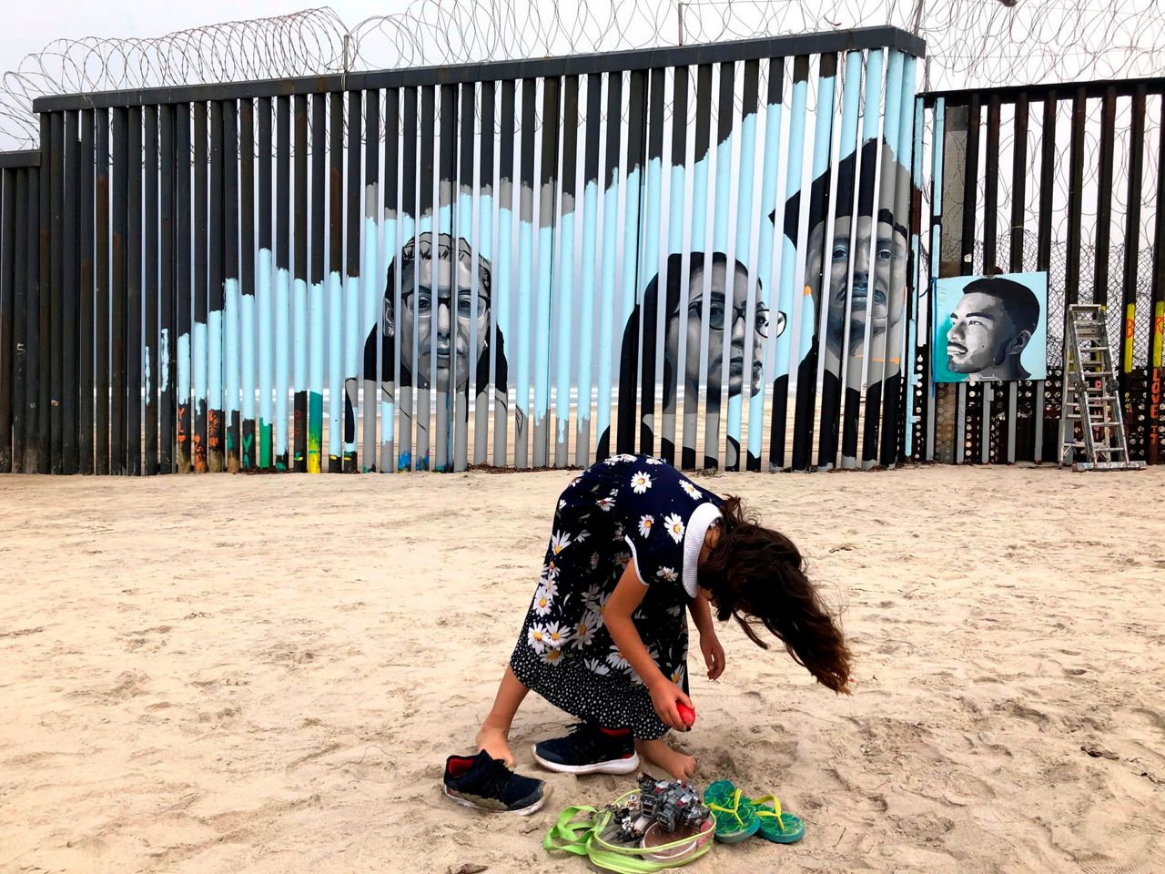 Interactive border wall mural tells stories of deported