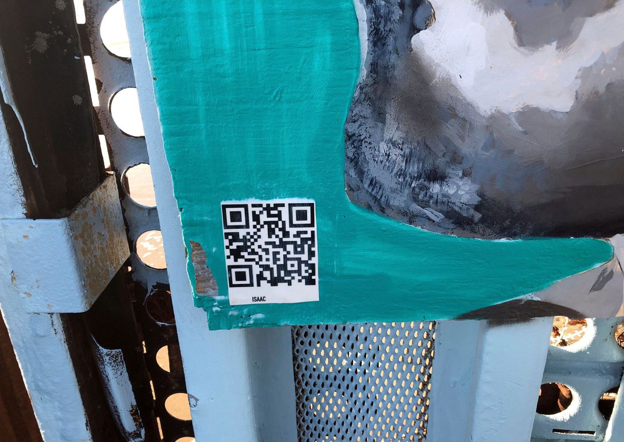 Interactive border wall mural tells stories of deported