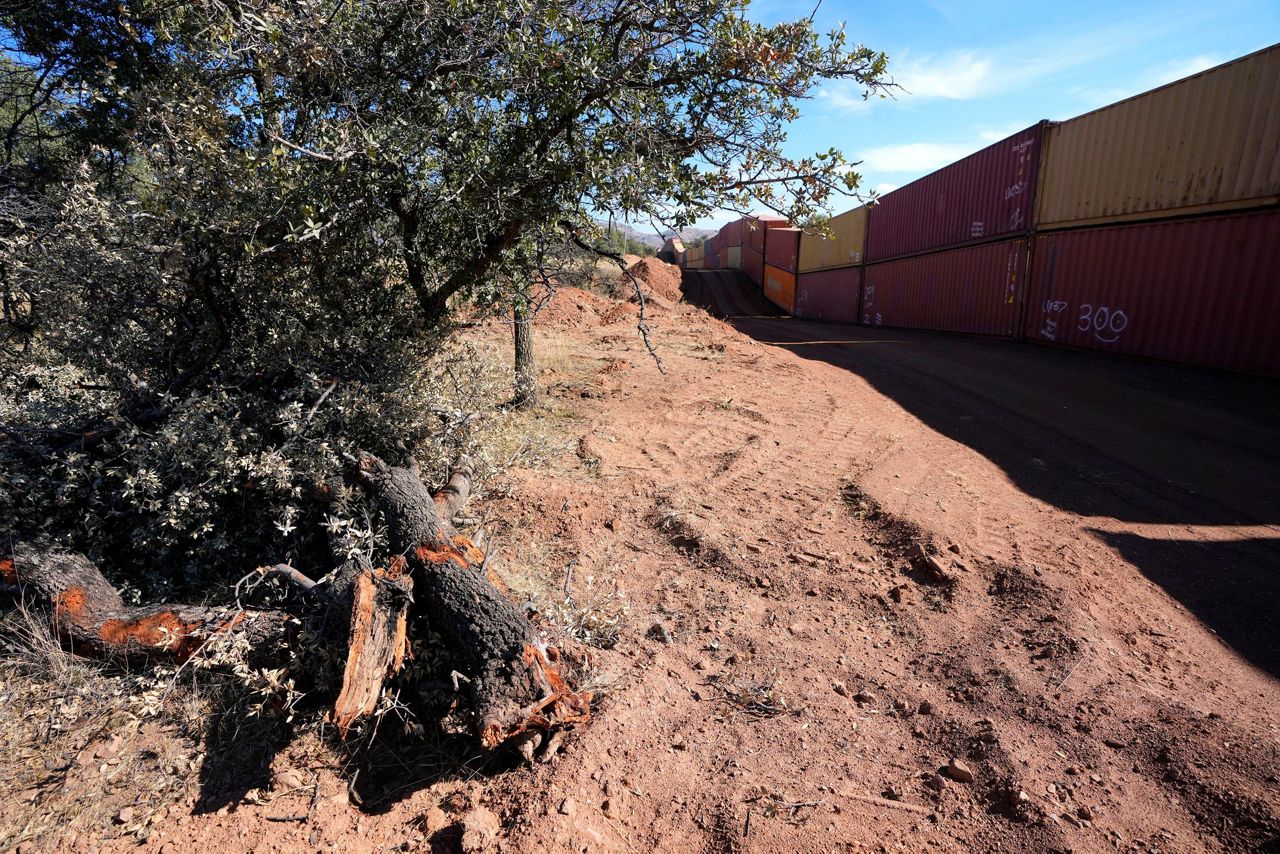 Arizona Gov. Ducey stacks containers on border at term's end