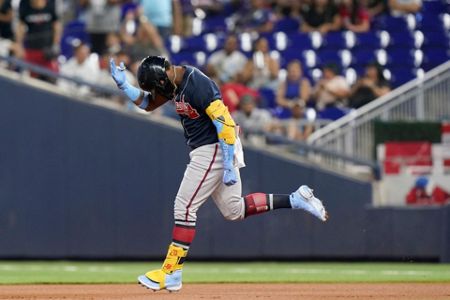 Tromp's 3 hits, 3 RBIs lead Braves over Marlins in Game 1 - Now