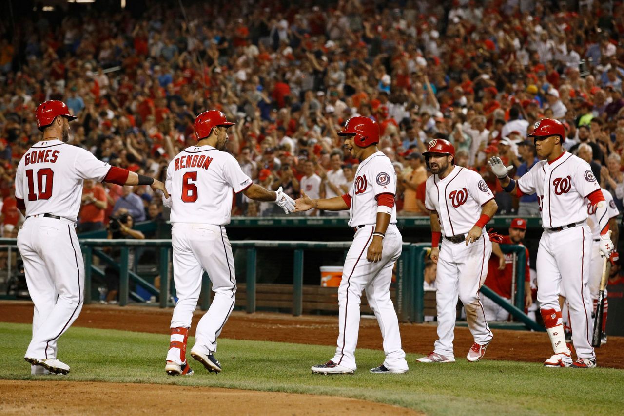 Rendon slam leads Nats over Braves 6-3, lead cut to 4½ games