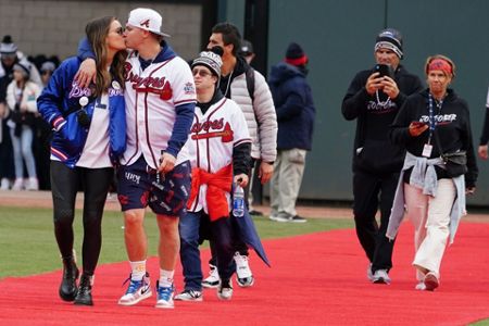 Atlanta Braves players walk out on red carpet at Truist Park