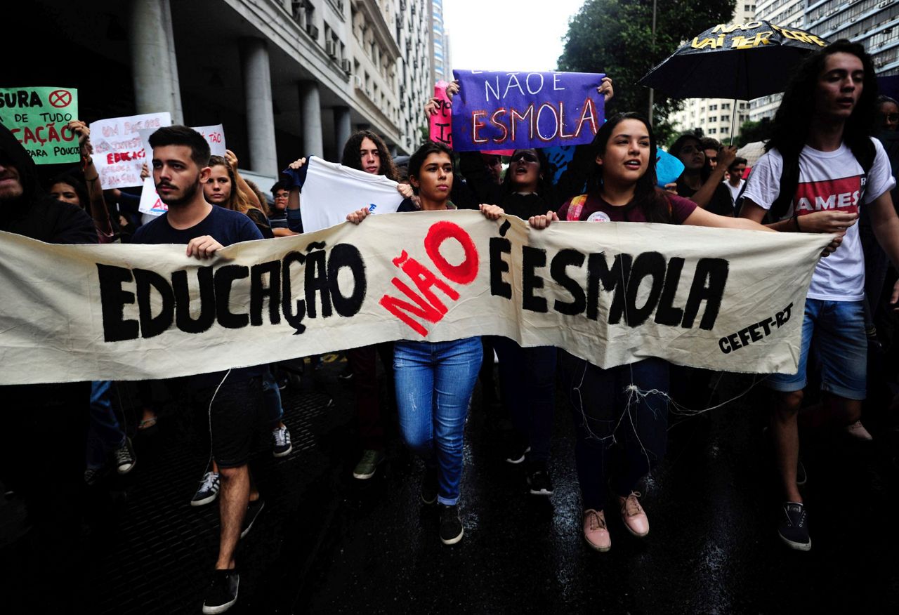 Crowds protest cuts in federal funding for Brazil schools