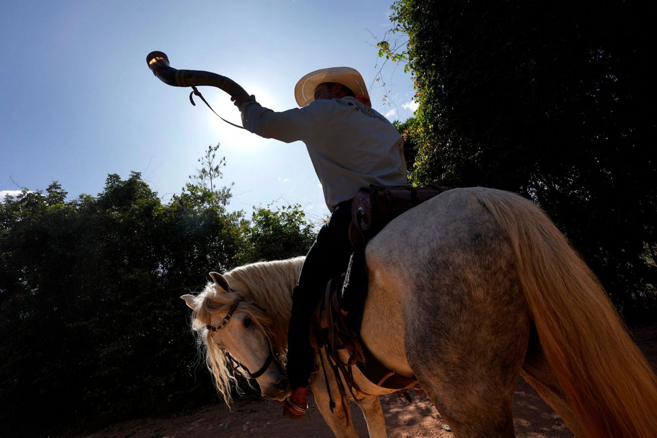 AP PHOTOS: Brazil procession celebrates the Holy Spirit