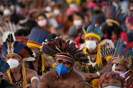 Indigenous people march for land rights in Brazil ahead of court ruling