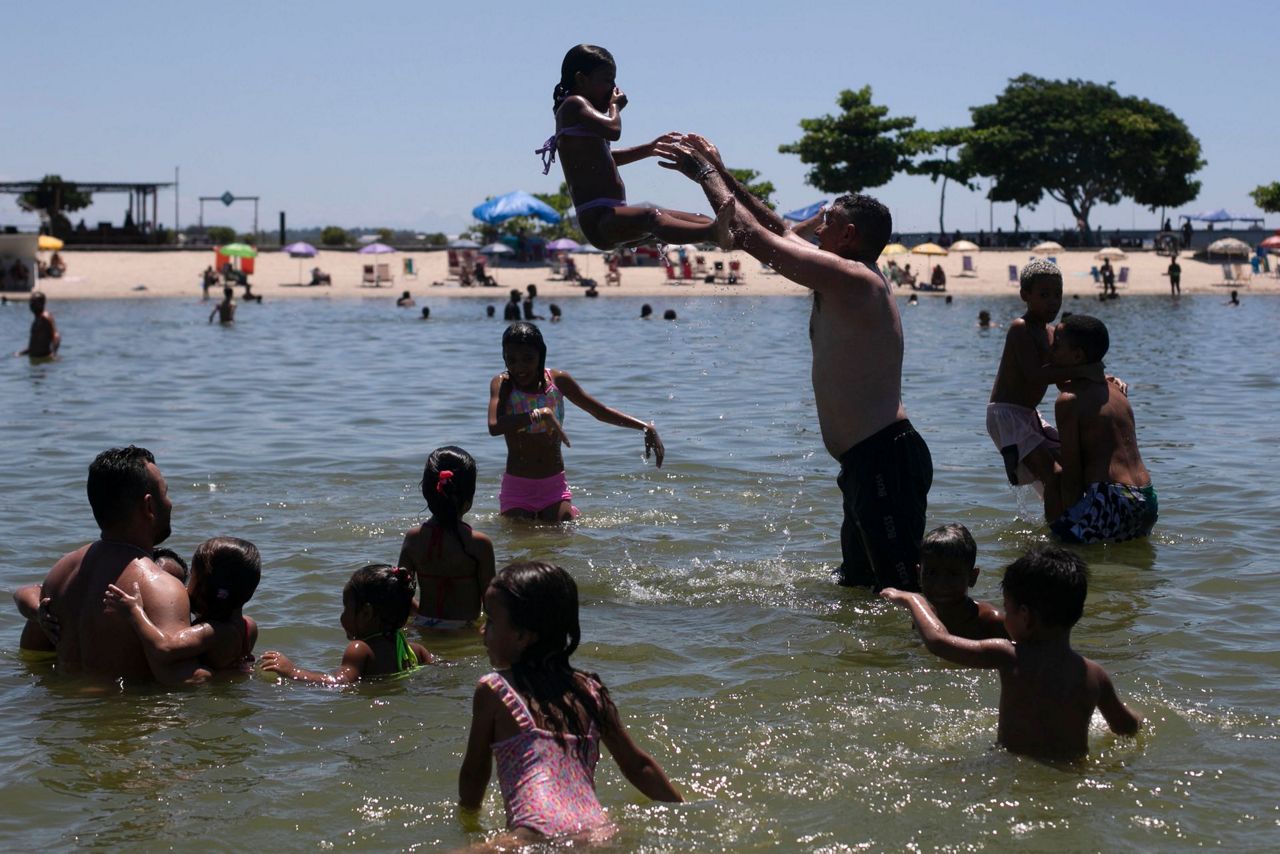 Rio de Janeiro's hottest day in at least a decade sends residents to ...