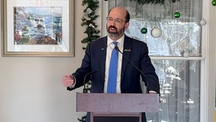 Yellow Light Breen, president and CEO of the Maine Development Foundation, talks in Kennebunkport Wednesday at the unveiling of a new report detailing Maine's economic growth in 2022 and suggesting areas of improvement. (Spectrum News/Sean Murphy)
