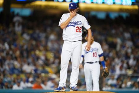 Los Angeles Dodgers infielder Trea Turner in a dugout during the MLB