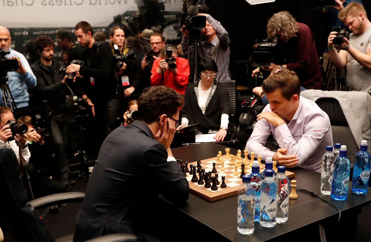 Norway's Carlsen beats Caruana to defend chess world title