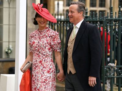 AP PHOTOS: Kentucky Derby hat styles: Bigger is often better