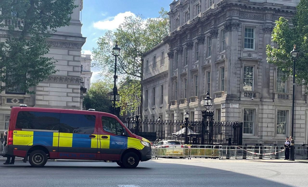 Man arrested after car collides with gates of Downing Street, where UK ...