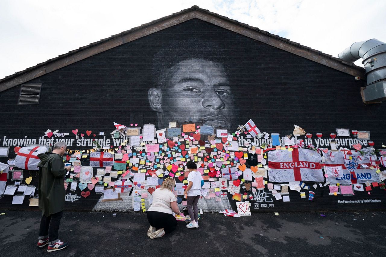 Mural in soccer star's hometown becomes anti-racism symbol