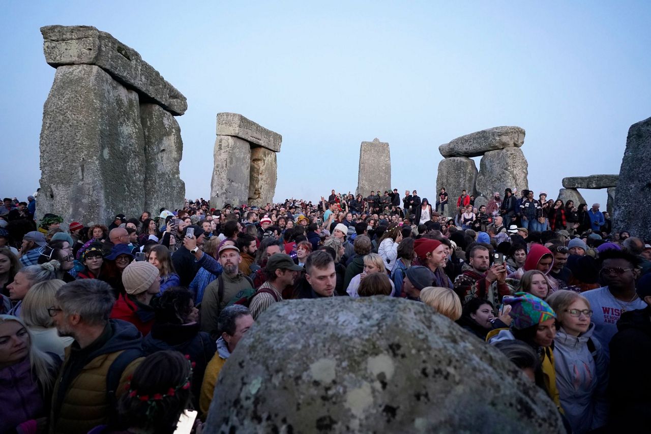 Thousands gather at Stonehenge for annual ritual marking the summer