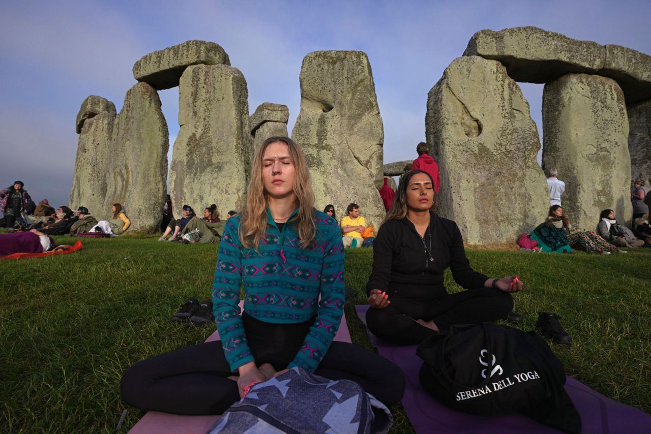 Thousands gather at Stonehenge for annual ritual marking the summer