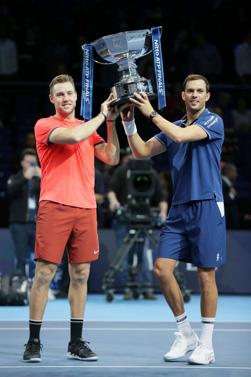 Bryan, Sock save match point to win ATP Finals doubles title