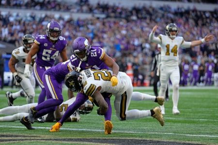 Minnesota Vikings wide receiver Justin Jefferson (18) walks into to score a  touchdown in the fourth quarter of an NFL match between Minnesota Vikings  and New Orleans Saints at the Tottenham Hotspur