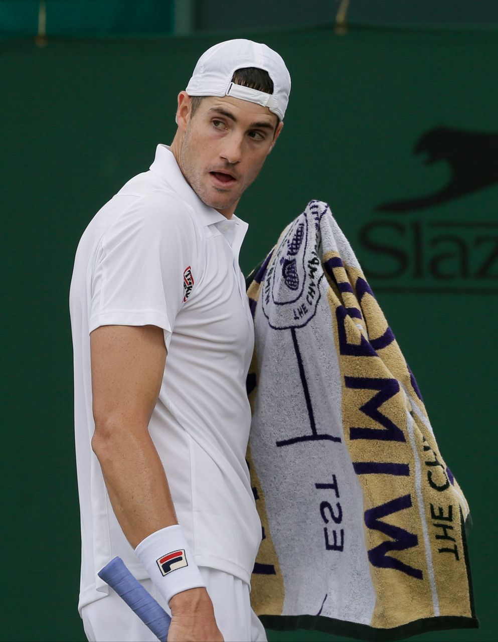 Isner hits 64 aces, saves 2 match points, in Wimbledon win