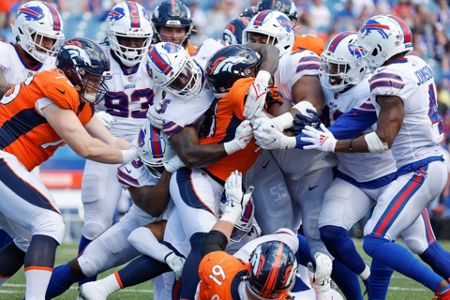 Buffalo Bills tight end O.J. Howard runs on the field during the first half  of a preseason NFL football game against the Denver Broncos in Orchard  Park, N.Y., Saturday, Aug. 20, 2022. (