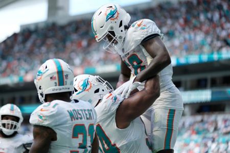 Miami Dolphins score 70 points and take a knee rather than take a shot at  NFL scoring mark