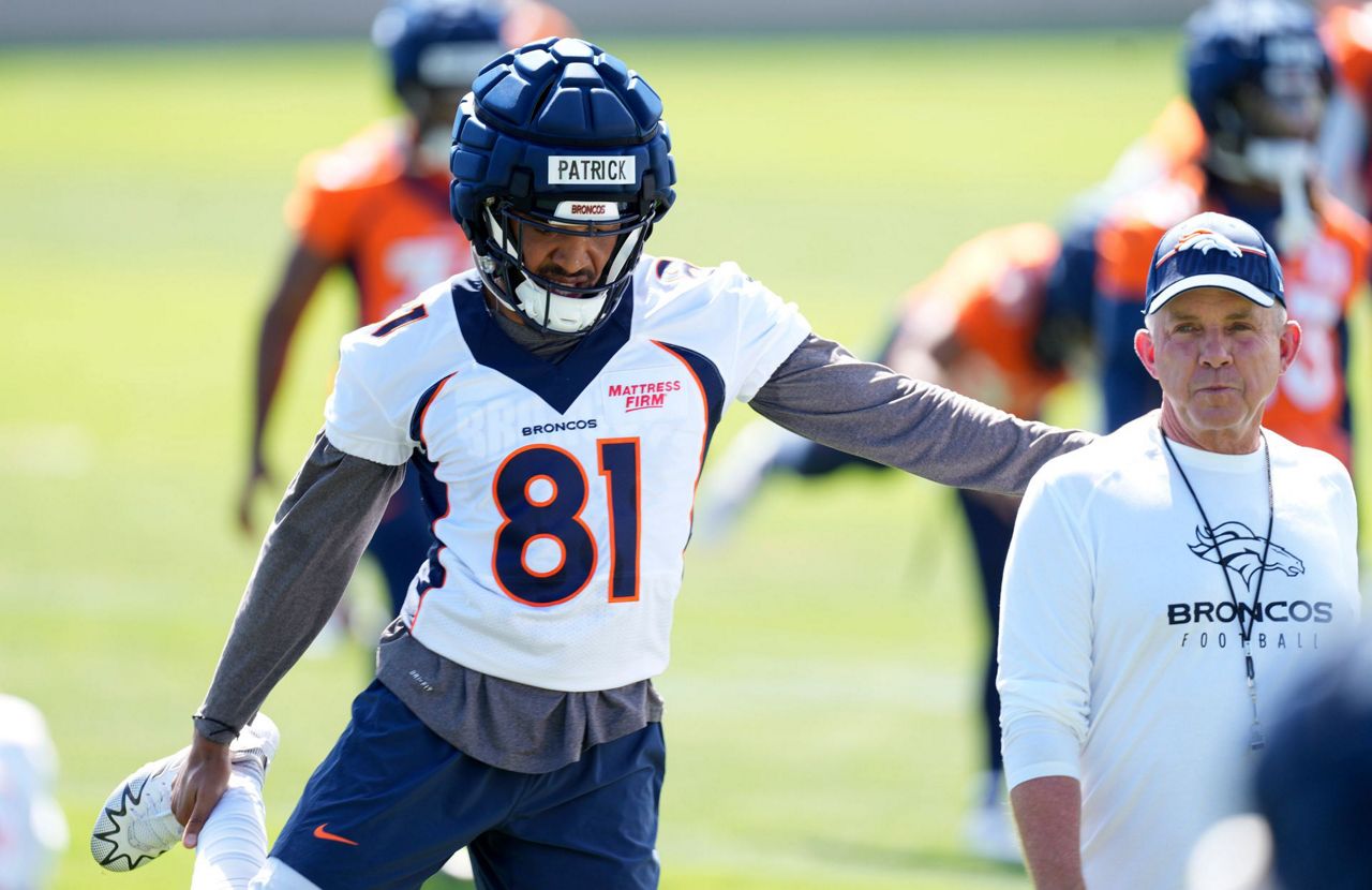 Broncos receiver Tim Patrick carted off field with right leg injury