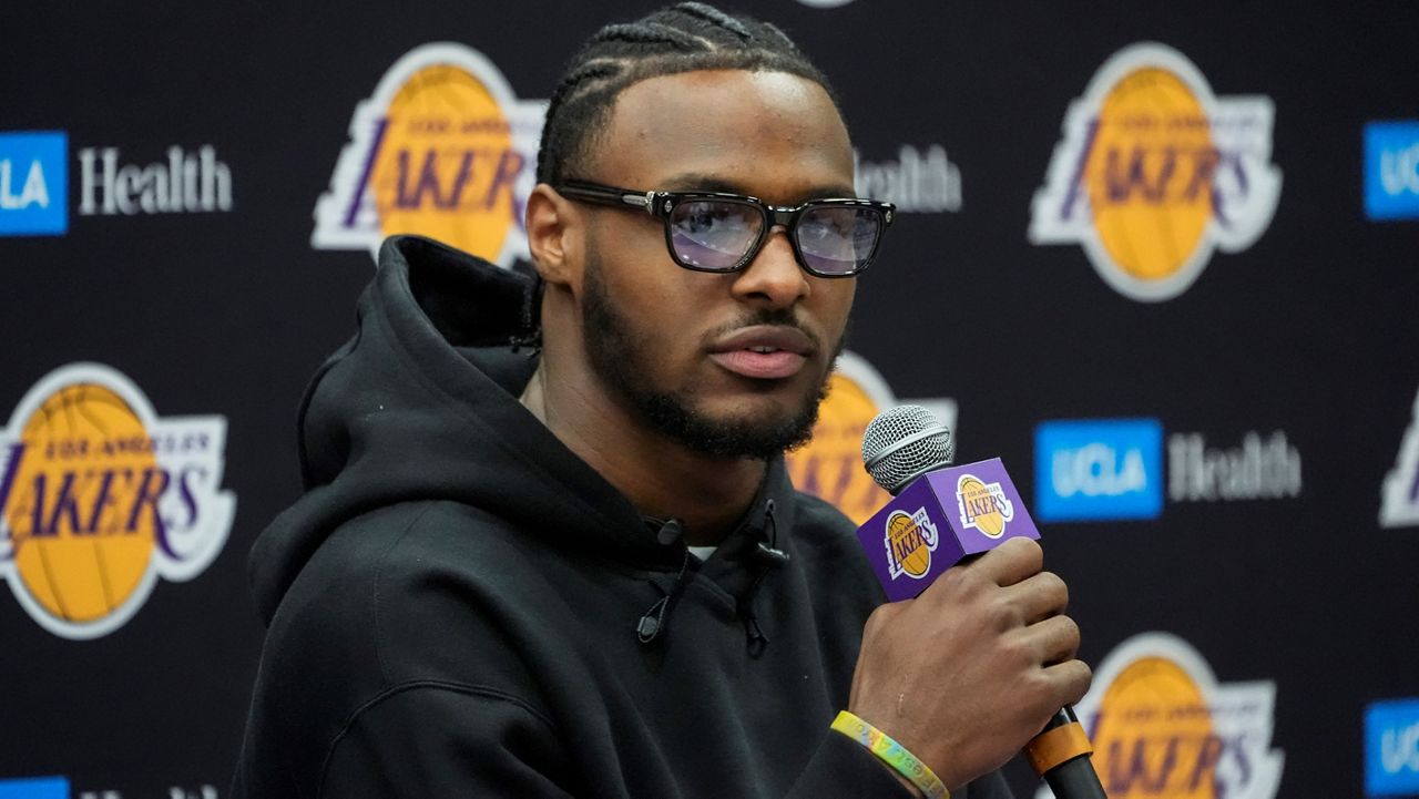 Los Angeles Lakers draft pick Bronny James speaks during the NBA basketball team's news conference in El Segundo, Calif., on Tuesday. (AP Photo/Damian Dovarganes)