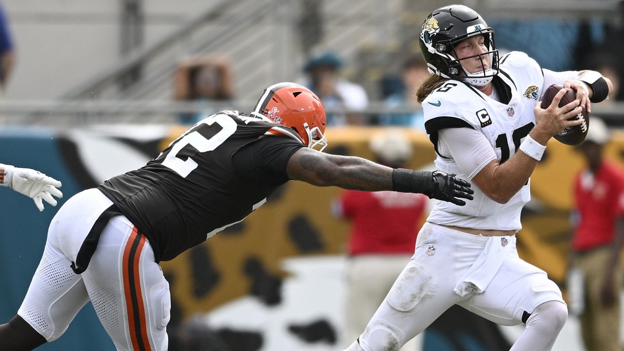 Cleveland Browns defensive tackle Quinton Jefferson (72) sacks Jacksonville Jaguars quarterback Trevor Lawrence (16) during the second half of an NFL football game Sunday, Sept. 15, 2024, in Jacksonville, Fla. (AP Photo/Phelan M. Ebenhack)